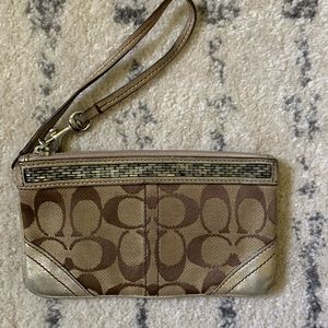 Sold Beaded trim coach wristlet used